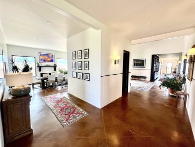 Situated on 6.77 acres spanning three independent parcels (two on Taos Country Club in New Mexico - for sale on GolfHomes.com, golf home, golf lot