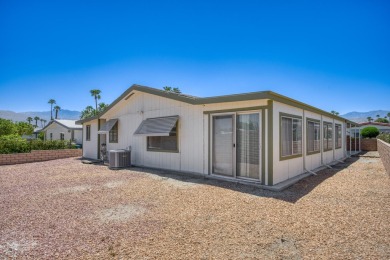 Charming 2-bedroom, 2-bath manufactured home in Palm Desert's on Portola Country Club in California - for sale on GolfHomes.com, golf home, golf lot