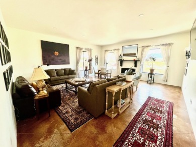 Situated on 6.77 acres spanning three independent parcels (two on Taos Country Club in New Mexico - for sale on GolfHomes.com, golf home, golf lot