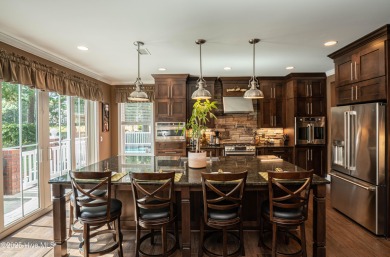 Welcome to this stunning custom-built home in Ocean Ridge on Ocean Ridge Plantation in North Carolina - for sale on GolfHomes.com, golf home, golf lot