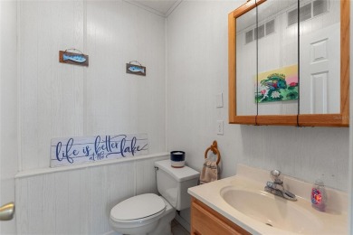 Charming Canal-Front Home on a Full Acre in Indian Lake Estates! on Indian Lake Estates Golf and Country Club in Florida - for sale on GolfHomes.com, golf home, golf lot