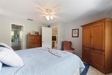 Charming Canal-Front Home on a Full Acre in Indian Lake Estates! on Indian Lake Estates Golf and Country Club in Florida - for sale on GolfHomes.com, golf home, golf lot
