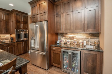 Welcome to this stunning custom-built home in Ocean Ridge on Ocean Ridge Plantation in North Carolina - for sale on GolfHomes.com, golf home, golf lot
