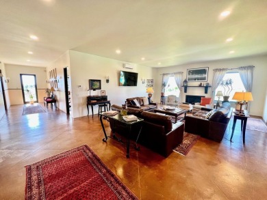 Situated on 6.77 acres spanning three independent parcels (two on Taos Country Club in New Mexico - for sale on GolfHomes.com, golf home, golf lot