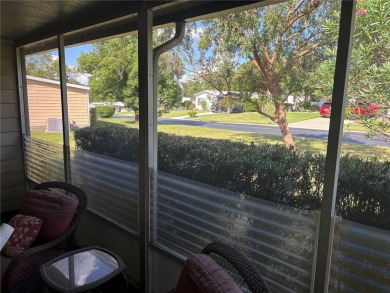 Spacious 2-bedroom, 2-bath home on a large corner lot with over on Zellwood Station Country Club in Florida - for sale on GolfHomes.com, golf home, golf lot