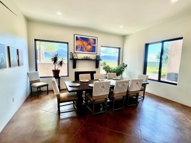 Situated on 6.77 acres spanning three independent parcels (two on Taos Country Club in New Mexico - for sale on GolfHomes.com, golf home, golf lot