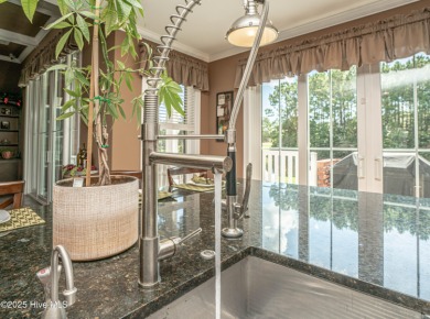 Welcome to this stunning custom-built home in Ocean Ridge on Ocean Ridge Plantation in North Carolina - for sale on GolfHomes.com, golf home, golf lot