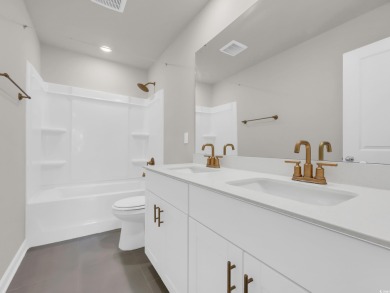 Better than new and ready for you! This stunning 2024-built on The Members Club At Grande Dunes in South Carolina - for sale on GolfHomes.com, golf home, golf lot
