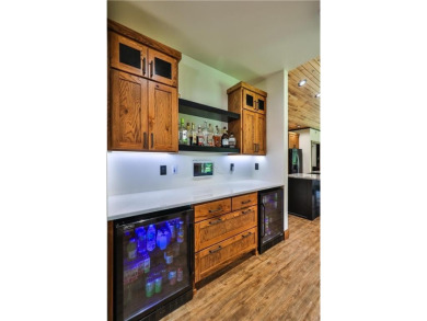 Experience luxury living in this masterfully crafted 2024 built on Blueberry Pines Golf CLub in Minnesota - for sale on GolfHomes.com, golf home, golf lot