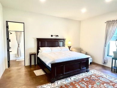 Situated on 6.77 acres spanning three independent parcels (two on Taos Country Club in New Mexico - for sale on GolfHomes.com, golf home, golf lot
