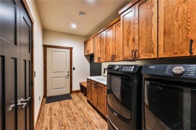 Experience luxury living in this masterfully crafted 2024 built on Blueberry Pines Golf CLub in Minnesota - for sale on GolfHomes.com, golf home, golf lot