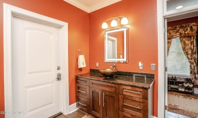 Welcome to this stunning custom-built home in Ocean Ridge on Ocean Ridge Plantation in North Carolina - for sale on GolfHomes.com, golf home, golf lot