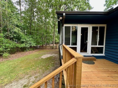 Charming Nantucket-style 3BR/2BA home in the gated lake & golf on Carolina Lakes Country Club in North Carolina - for sale on GolfHomes.com, golf home, golf lot