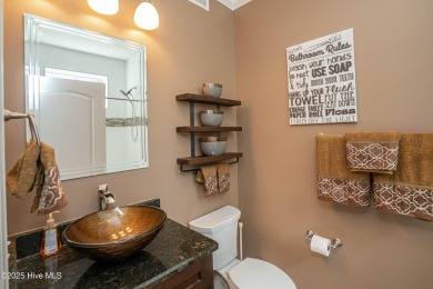 Welcome to this stunning custom-built home in Ocean Ridge on Ocean Ridge Plantation in North Carolina - for sale on GolfHomes.com, golf home, golf lot