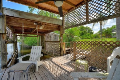 Charming Canal-Front Home on a Full Acre in Indian Lake Estates! on Indian Lake Estates Golf and Country Club in Florida - for sale on GolfHomes.com, golf home, golf lot