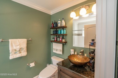 Welcome to this stunning custom-built home in Ocean Ridge on Ocean Ridge Plantation in North Carolina - for sale on GolfHomes.com, golf home, golf lot
