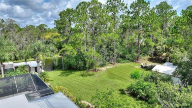 Charming Canal-Front Home on a Full Acre in Indian Lake Estates! on Indian Lake Estates Golf and Country Club in Florida - for sale on GolfHomes.com, golf home, golf lot