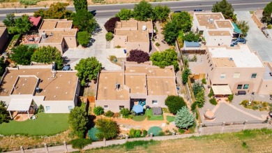 Beauty and peace abound in this light-filled home. Enjoy on Santa Fe Country Club in New Mexico - for sale on GolfHomes.com, golf home, golf lot