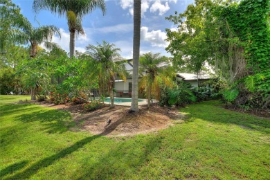 Charming Canal-Front Home on a Full Acre in Indian Lake Estates! on Indian Lake Estates Golf and Country Club in Florida - for sale on GolfHomes.com, golf home, golf lot