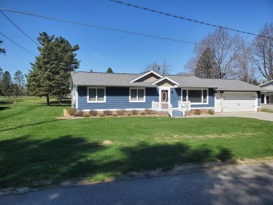Charming ranch style home situated on the 15th hole of White on White Deer Country Club in Michigan - for sale on GolfHomes.com, golf home, golf lot