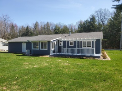 Charming ranch style home situated on the 15th hole of White on White Deer Country Club in Michigan - for sale on GolfHomes.com, golf home, golf lot