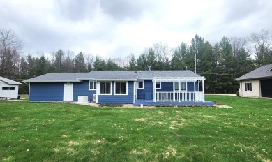 Charming ranch style home situated on the 15th hole of White on White Deer Country Club in Michigan - for sale on GolfHomes.com, golf home, golf lot