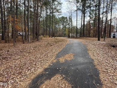 Ready to park your RV/ Your Dream Getaway Awaits at the Coveted on River Golf and Country Club at Lake Royale in North Carolina - for sale on GolfHomes.com, golf home, golf lot