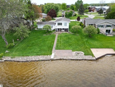 THE LAKE HOUSE. A prime location. Situated right where the on The Pines Golf Course at Lake Isabella in Michigan - for sale on GolfHomes.com, golf home, golf lot