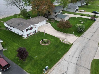 THE LAKE HOUSE. A prime location. Situated right where the on The Pines Golf Course at Lake Isabella in Michigan - for sale on GolfHomes.com, golf home, golf lot