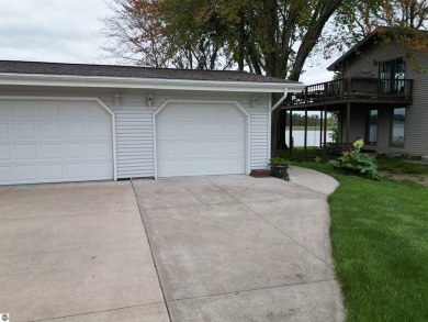 THE LAKE HOUSE. A prime location. Situated right where the on The Pines Golf Course at Lake Isabella in Michigan - for sale on GolfHomes.com, golf home, golf lot