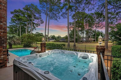 This one sizzles with style! Spectacular views of the 13th green on River Hills Golf and Country Club in South Carolina - for sale on GolfHomes.com, golf home, golf lot