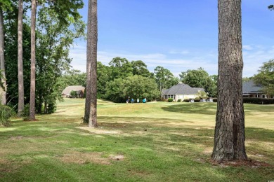 This one sizzles with style! Spectacular views of the 13th green on River Hills Golf and Country Club in South Carolina - for sale on GolfHomes.com, golf home, golf lot