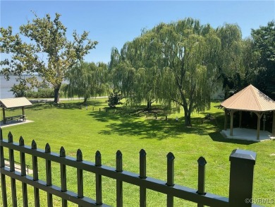 An inviting Two Story, 4 Bedroom, 2.5 Bath Colonial centrally on Hobbs Hole Golf Course in Virginia - for sale on GolfHomes.com, golf home, golf lot
