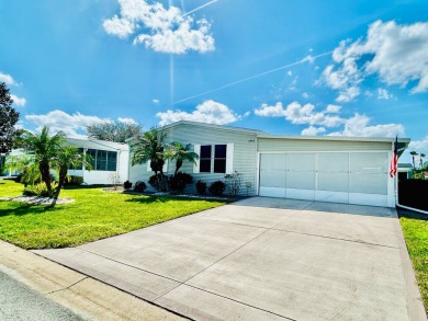 This beautifully renovated residence features 2 bedrooms and 2 on Crane Lakes Golf and Country Club in Florida - for sale on GolfHomes.com, golf home, golf lot