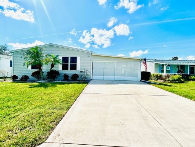 This beautifully renovated residence features 2 bedrooms and 2 on Crane Lakes Golf and Country Club in Florida - for sale on GolfHomes.com, golf home, golf lot