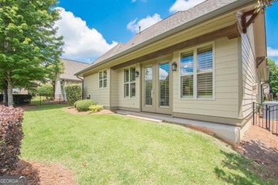 Step into luxury at this 4-bedroom, 4-bathroom cottage in Newnan on Summergrove Golf Club in Georgia - for sale on GolfHomes.com, golf home, golf lot