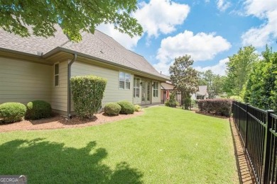 Step into luxury at this 4-bedroom, 4-bathroom cottage in Newnan on Summergrove Golf Club in Georgia - for sale on GolfHomes.com, golf home, golf lot