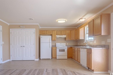MOVE -IN READY!!! The inside of the house and garage are freshly on Mineral Mound Golf Course in Kentucky - for sale on GolfHomes.com, golf home, golf lot