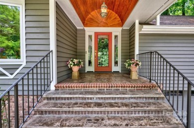 A BRAND-NEW ROOF crowns this beauty! The elegant entry welcomes on River Hills Country Club in South Carolina - for sale on GolfHomes.com, golf home, golf lot