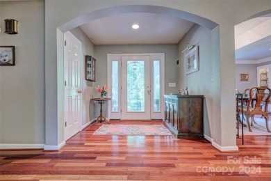 A BRAND-NEW ROOF crowns this beauty! The elegant entry welcomes on River Hills Country Club in South Carolina - for sale on GolfHomes.com, golf home, golf lot