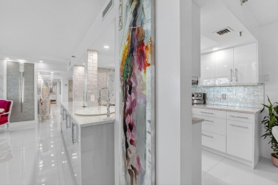 Discover luxury living in this beautifully renovated condo at on Boca West Golf and Country Club in Florida - for sale on GolfHomes.com, golf home, golf lot