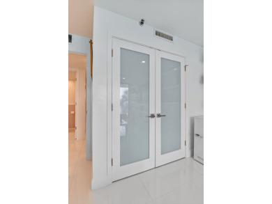 Discover luxury living in this beautifully renovated condo at on Boca West Golf and Country Club in Florida - for sale on GolfHomes.com, golf home, golf lot