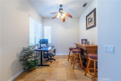 Charming 2-bedroom, 2-bathroom home with a versatile den/office on  in California - for sale on GolfHomes.com, golf home, golf lot