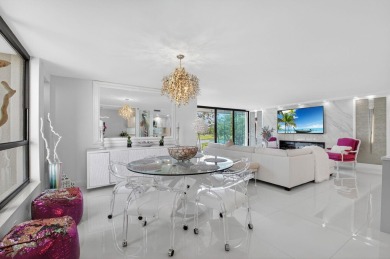 Discover luxury living in this beautifully renovated condo at on Boca West Golf and Country Club in Florida - for sale on GolfHomes.com, golf home, golf lot