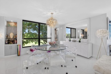 Discover luxury living in this beautifully renovated condo at on Boca West Golf and Country Club in Florida - for sale on GolfHomes.com, golf home, golf lot