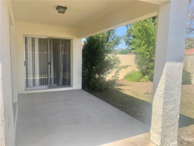 Welcome to your cozy and charming 2 bedroom, 2 bath home in the on Tierra Del Sol Golf and Country Club in Florida - for sale on GolfHomes.com, golf home, golf lot