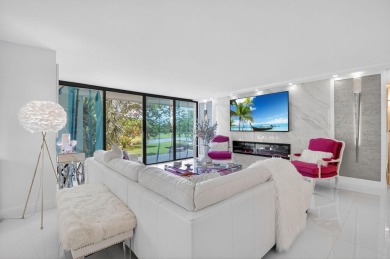 Discover luxury living in this beautifully renovated condo at on Boca West Golf and Country Club in Florida - for sale on GolfHomes.com, golf home, golf lot
