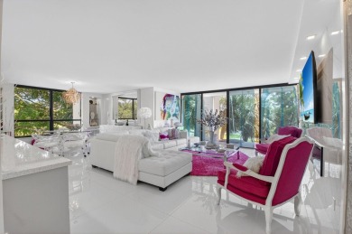 Discover luxury living in this beautifully renovated condo at on Boca West Golf and Country Club in Florida - for sale on GolfHomes.com, golf home, golf lot