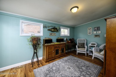 Perfectly situated in the waterfront community of Fairfield on Harbour Point Golf Club in North Carolina - for sale on GolfHomes.com, golf home, golf lot
