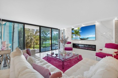 Discover luxury living in this beautifully renovated condo at on Boca West Golf and Country Club in Florida - for sale on GolfHomes.com, golf home, golf lot